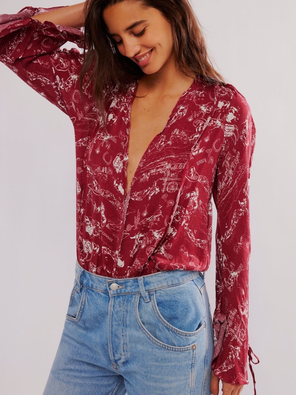 Free People western print bodysuit with bell sleeves
